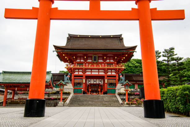Kyoto, Japan - May 30, 2018: Fushimi Inari Grand Shrine early morning. Founded in 711, the popular shrine is said to have as many as 32,000 sub-shrines across Japan