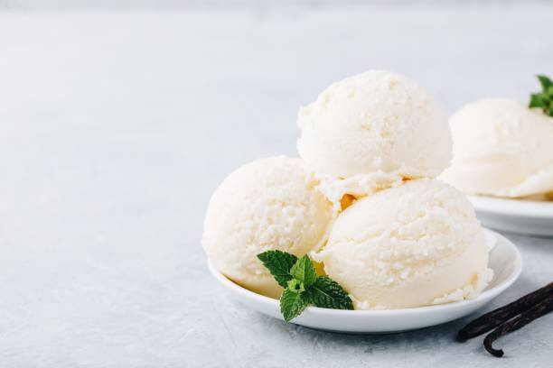 istock Vanilla ice cream with mint leaves 993653198