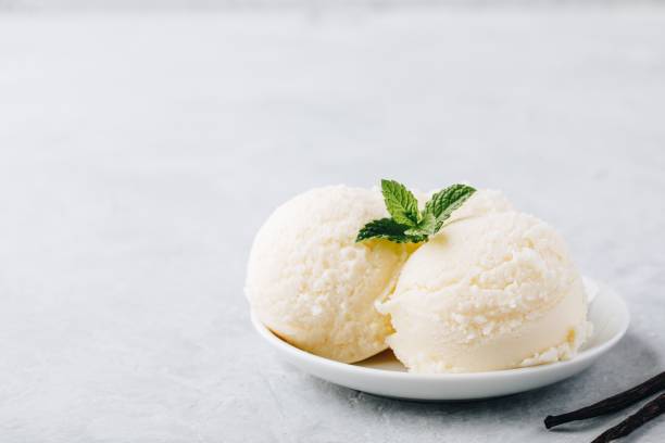 istock Vanilla ice cream with mint leaves 993653306