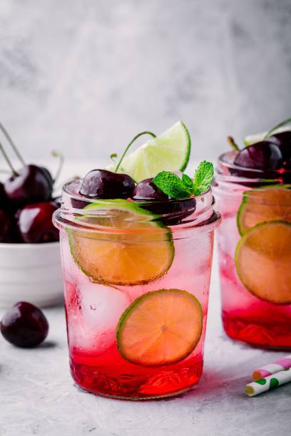 istock Refreshing cold summer drink cherry and lime lemonade 993654984