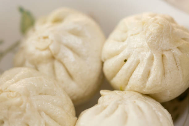 istock Steamed chinese bun closeup 993677216