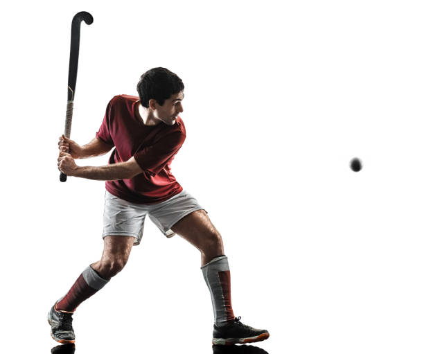 istock field hockey player man isolated silhouette white background 993683600