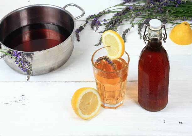 istock Homemade lavender syrup in a bottle and lemonade 993687024