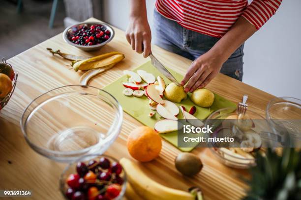Girl Preparing Fruit Salad Stock Photo - Download Image Now - Cutting, Fruit, Apple - Fruit