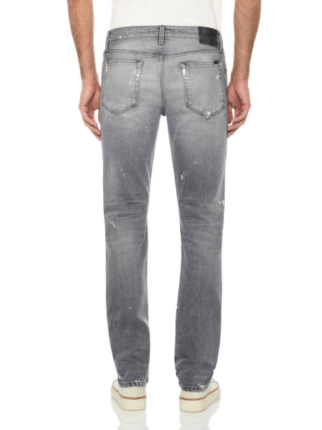 istock Dark blue/black denim for men’s paired with black/white sneakers and white background 993696258