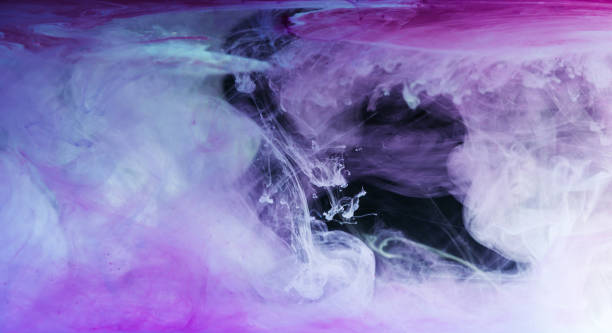 istock abstract blue, white and purple background with flowing ink 993702084