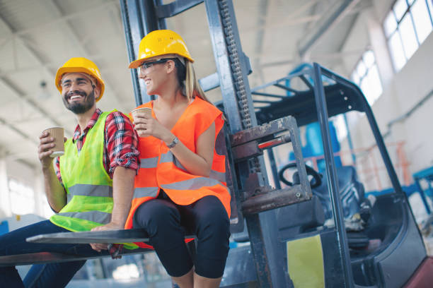 istock Workers in modern pvc factory at work 993705414