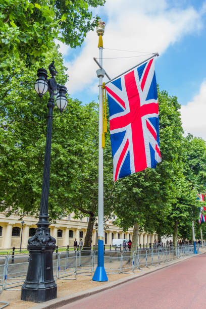 istock Union Jack flag hanging from a flag pole in London 993706504