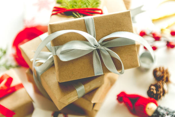 istock Christmas present, with red ribbon 993718996