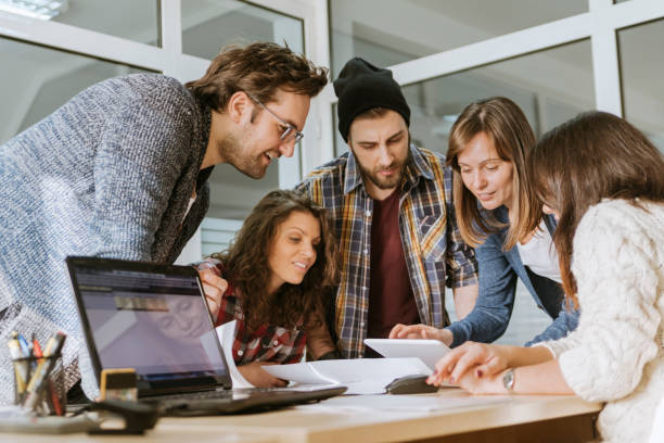 istock Start Up Team Of Freelancers In The Office 993719838