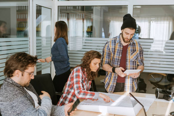 istock Start Up Team Of Freelancers In The Office 993721870