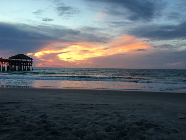 istock The sunrise over the pier on Cocoa Beach in Florida 993727036