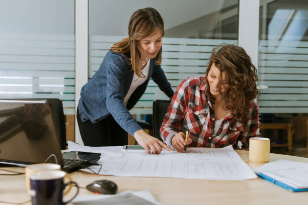 istock Start Up Team Of Freelancers In The Office 993727056