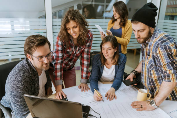 istock Start Up Team Of Freelancers In The Office 993727636
