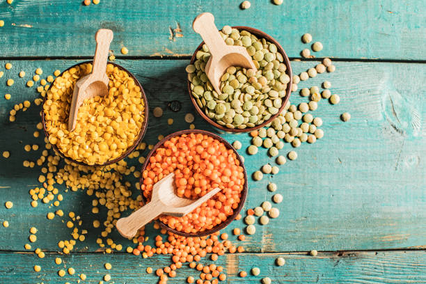 istock Red yellow green lentils high angle view 993733316