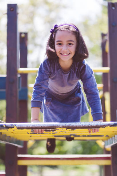 istock Happy kid on the jungle gym 993733436
