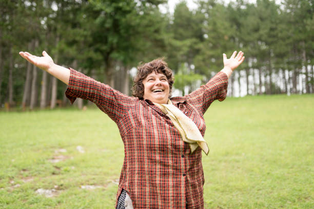 istock Cheerful woman loves nature 993737178