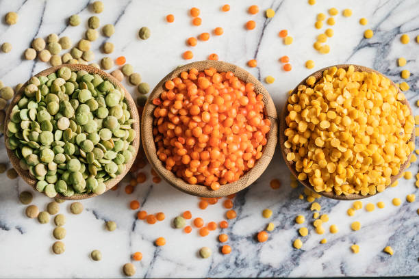 istock Red yellow green lentils high angle view 993738312