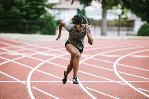 Mujer deportista Sprints para pista y campo photo