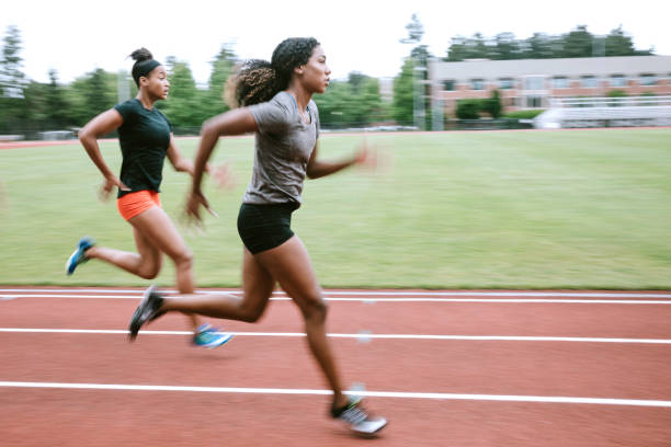 istock Women Athletes Run and Train for Track and Field 993744852