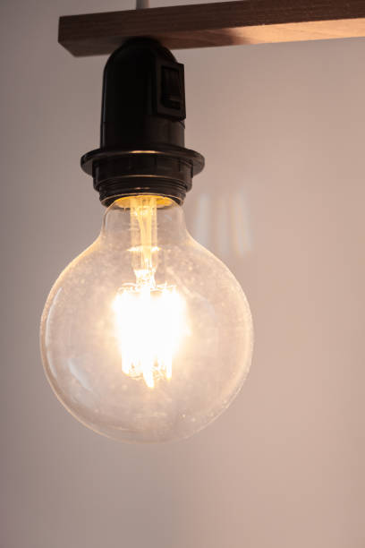 istock bulb next to the bed in the bedroom 993763134