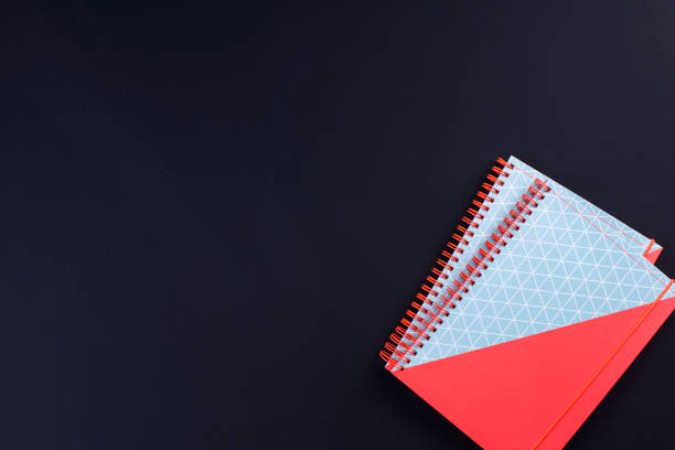 office supplies for school and office. Black background. Copy space.