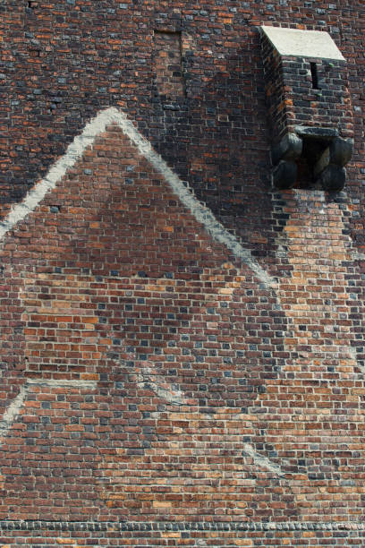 istock The wall of an old red-brick house 993773474