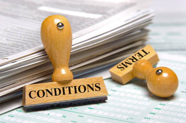 istock terms and conditions printed on rubber stamp 993779518