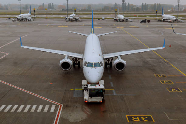 istock Planes undergo preflight service in the international airport 993801986