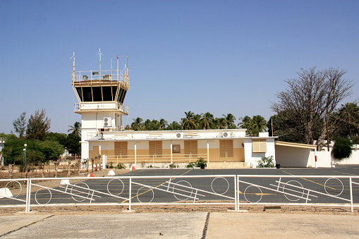 Lanseria airport in Johannesburg, South Africa with  a aeroplan seen on the runway on the hillside.