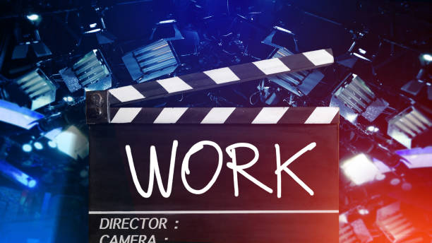 istock Work text title on film slate.Studio lighting equipment background 993953778