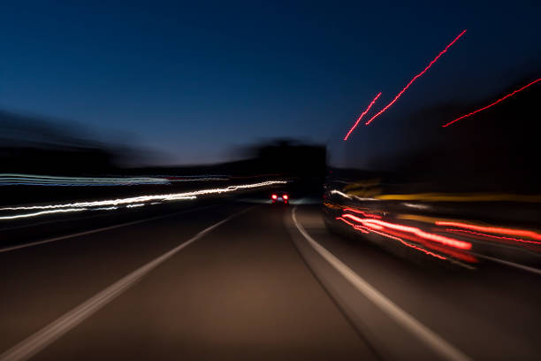 istock Traffic on highway - long exposure, motion blur 993954300