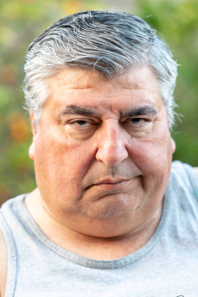 istock Serious overweight Mature man 993954874