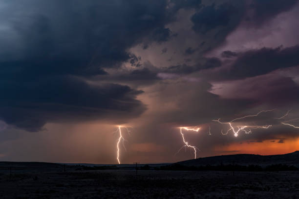 istock Large lightning strike at dusk on Tornado Alley 993955522