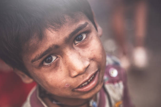 istock A portrait of a poor child from India 993955656