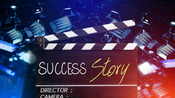 istock Success story text title on film slate.Studio lighting equipment background 993955670