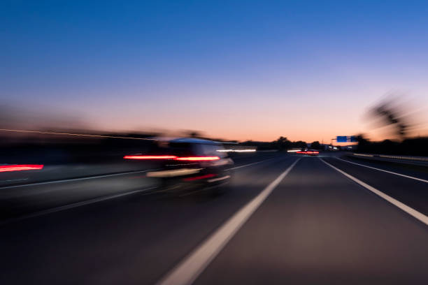 istock Traffic on highway at dusk 993955696