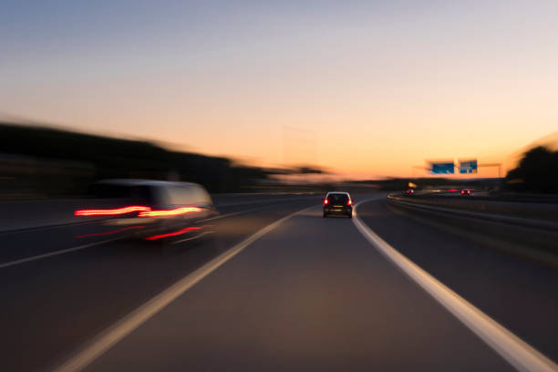 istock Traffic on highway at dusk 993956222