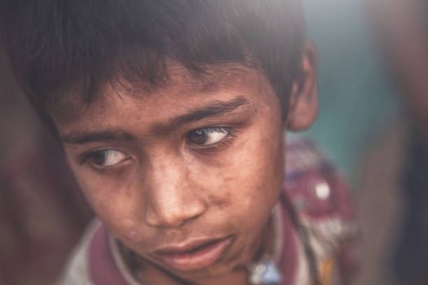 istock A portrait of a poor child from India 993956488
