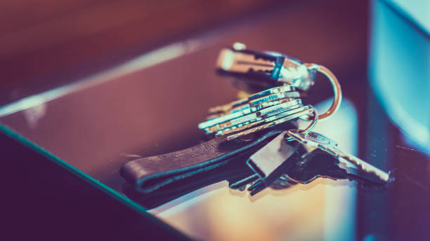 Object Photos Keys On Glass Table car keys table stock pictures, royalty-free photos & images