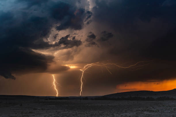 istock Large lightning strike at dusk on Tornado Alley 993956936