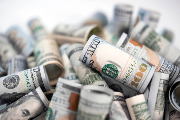 cash bills as symbol of financial stability - incomes imagens e fotografias de stock