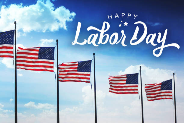 istock Happy Labor Day Text with Row of American Flags 993959606