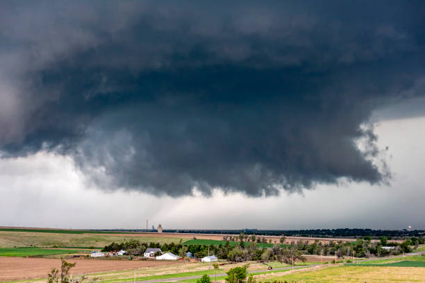 istock Tornado Supercell in Oklahoma over small town 993962394