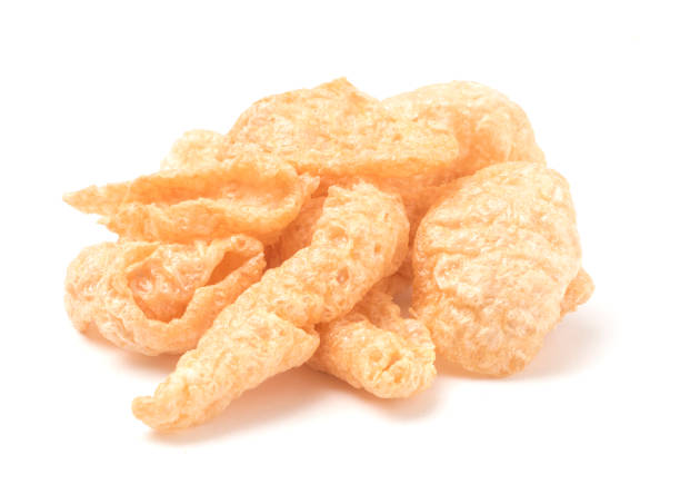 istock Crispy Pork Rinds on a White Background 993963046