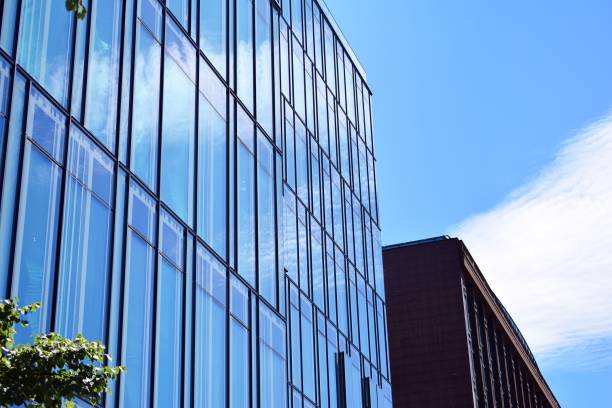 istock Blue clean glass wall of modern skyscraper 993963272