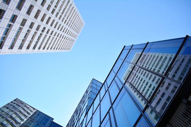 istock Blue clean glass wall of modern skyscraper 993963316