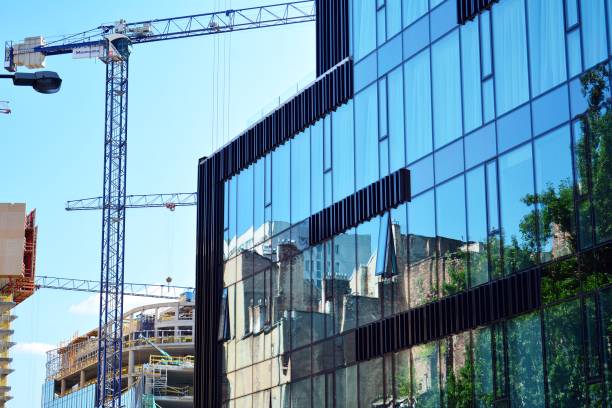istock Blue clean glass wall of modern skyscraper 993963504
