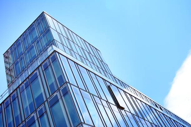 istock Blue clean glass wall of modern skyscraper 993963892