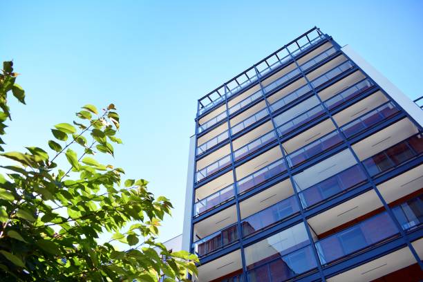 istock Brand new apartment building on sunny day 993964308